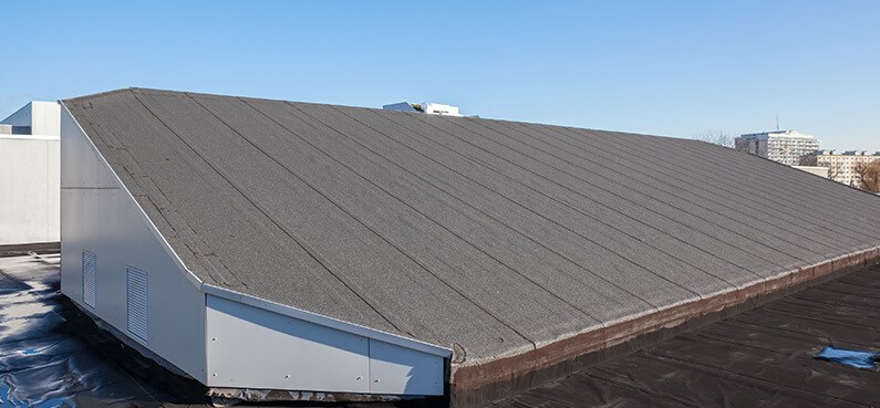 Bitumen roofing material on a roof in Michigan