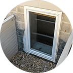 white basement egress windows from outside house in Michigan