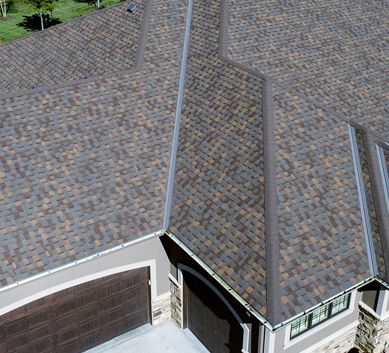 Forest Hills House with Atlas Copper Canyon Shingles